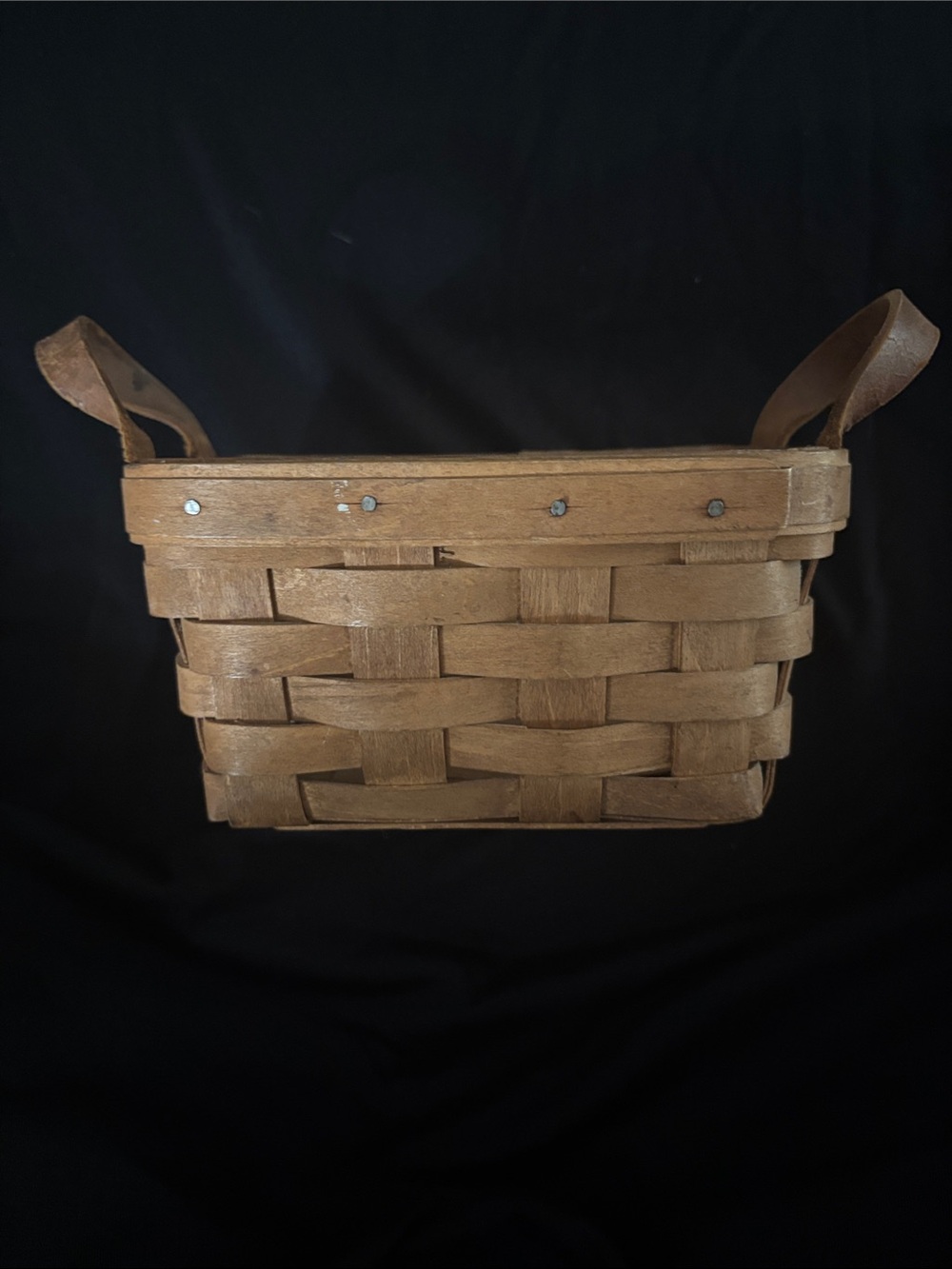 Longaberger woven basket with leather handles - tan